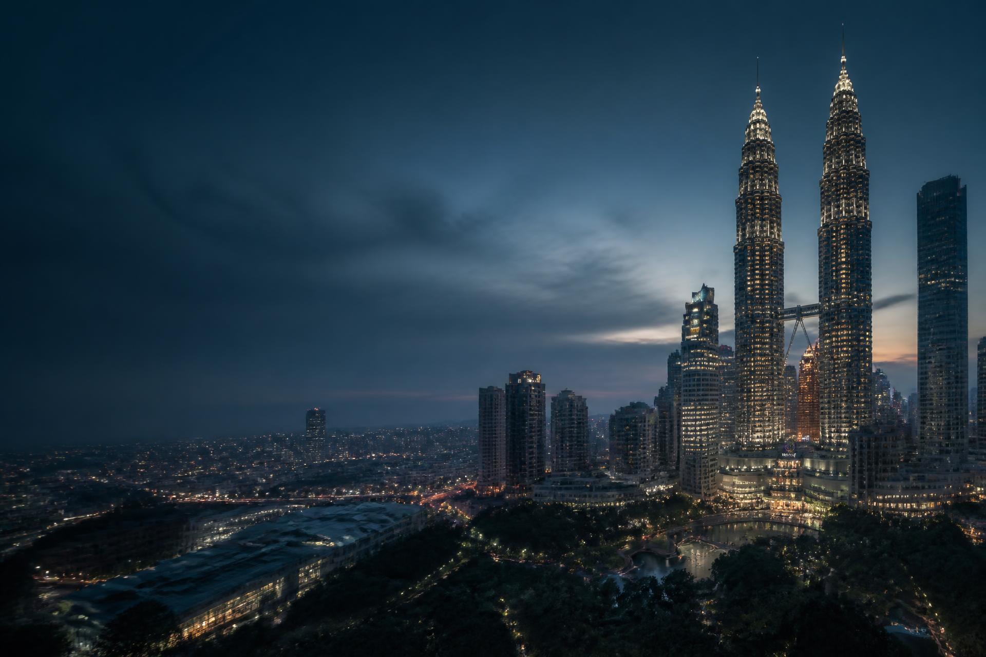 Southeast Asia skyline at dusk representing Dazz Commerce operations across Malaysia, Singapore, and Indonesia